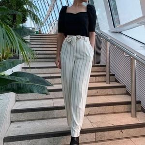 Wide cut tie belt pants